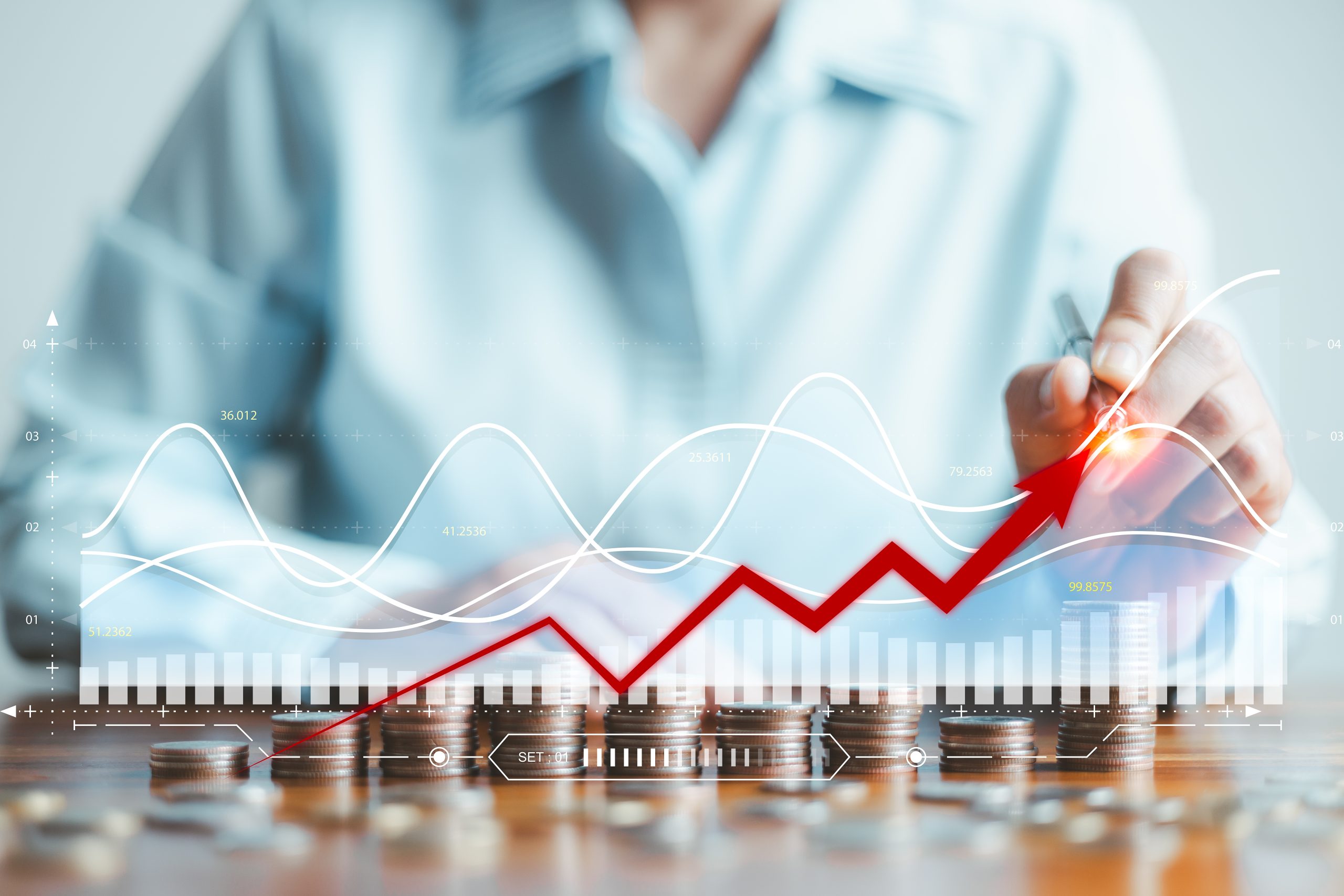 Фінансове планування та аналіз компанії — робоче місце з документами, графіками та ноутбуком